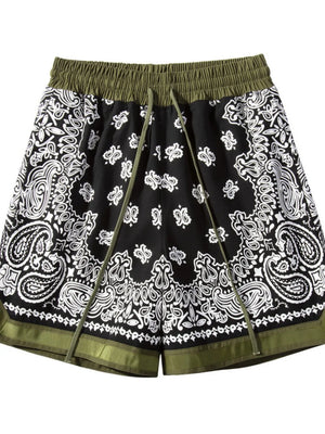 Black bandana print sport shorts with metallic trim and olive green waistband.