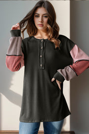 Black waffle knit henley shirt with colorblock sleeves