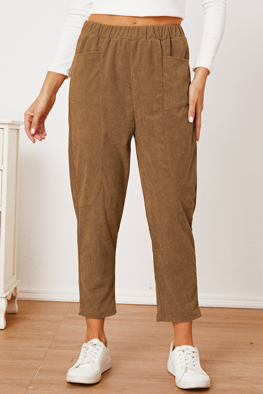 Camel corduroy barrel-leg utility pants with elastic waist and patch pockets.