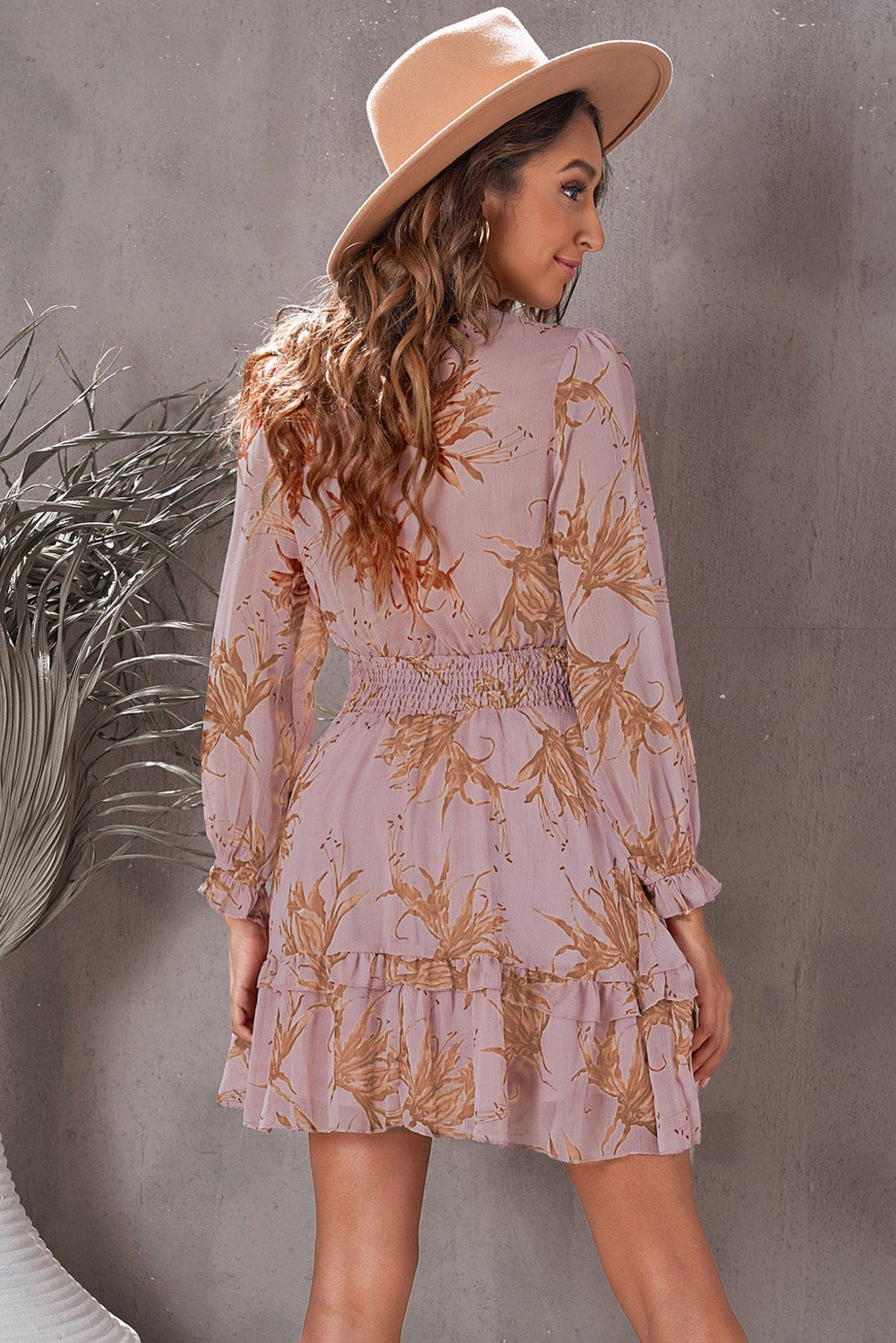 Light Mauve floral mini dress with smocked waist and ruffled hem.