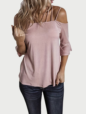Blush pink blouson top with strappy cold shoulder and flared 3/4 sleeves.