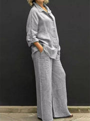 Light Gray relaxed two-piece set with buttoned collared top and wide-leg pants.