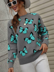 Gray knit crewneck sweater with all-over turquoise butterfly motif.