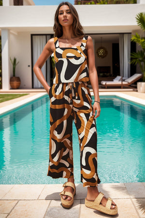 Zigzag print square neck jumpsuit with wide legs and drawstring waist.
