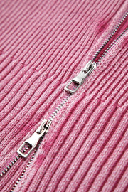 Pink ribbed knit top with silver zipper detail