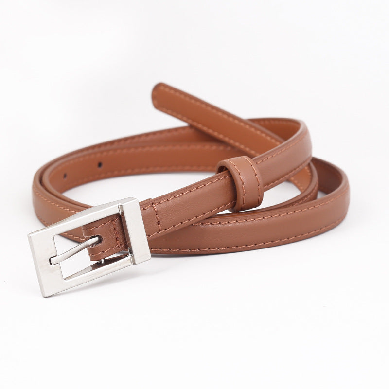 Caramel cowhide leather belt with metal buckle and stitched detail