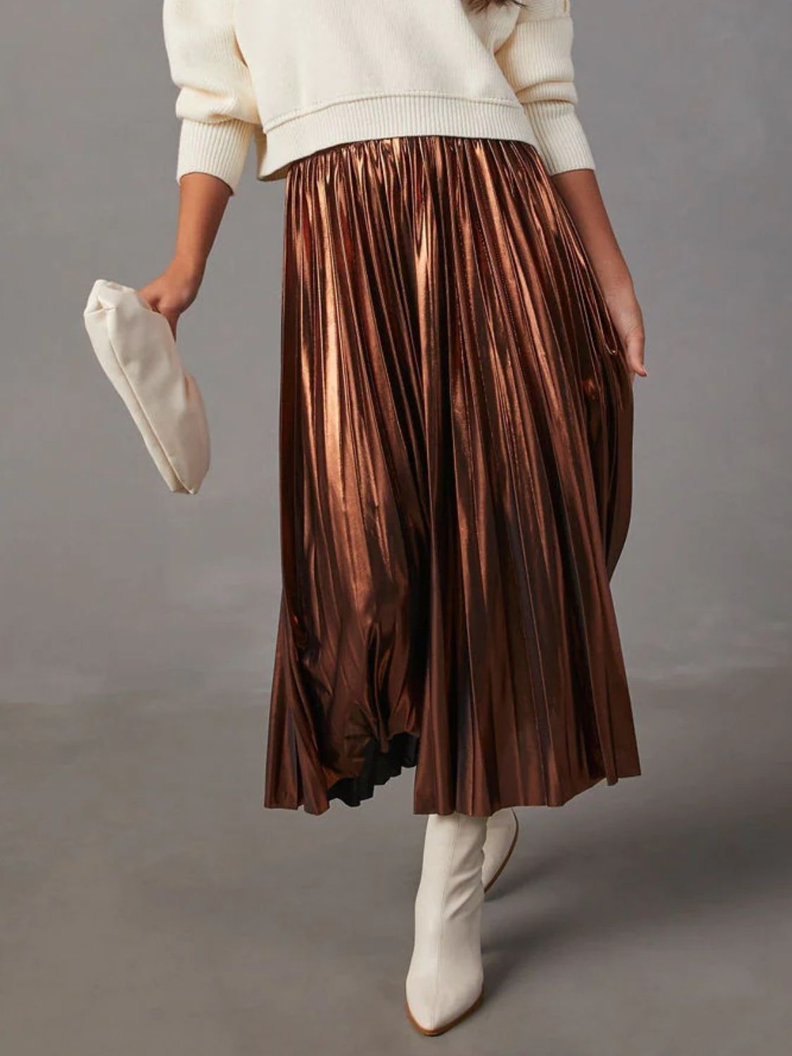 Metallic bronze accordion pleat midi skirt with a high waist.