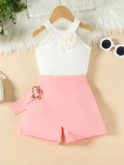 Toddler white halter top with floral applique and pink skort with belt detail