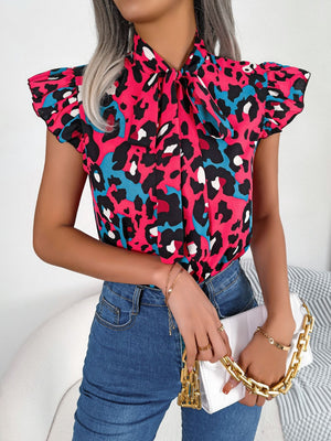 Hot Pink leopard print blouse with pussybow and ruffled cap sleeves.