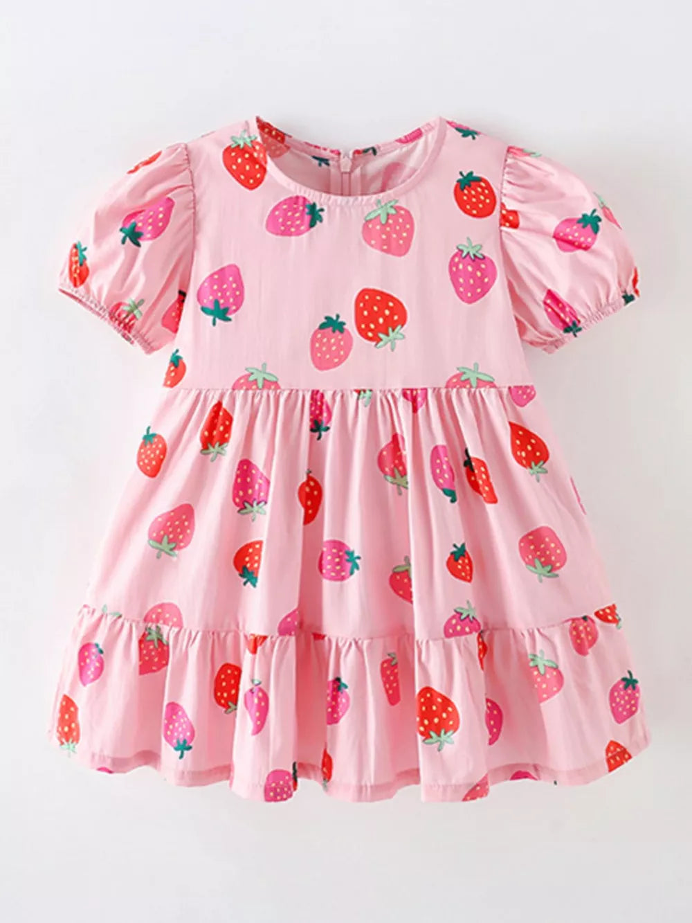 Pink tiered baby dress with puff sleeves and allover strawberry print, cotton blend.
