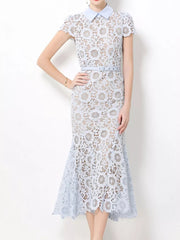 Light blue floral lace midi dress with cap sleeves, collar, and studded belt.