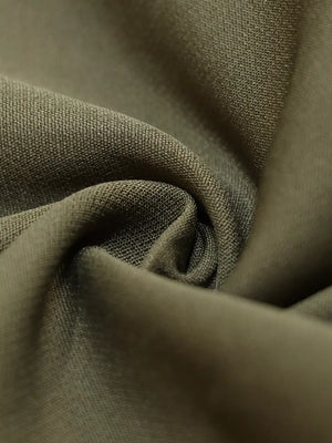 High-waisted Pleated Pants in Brown, editorial view