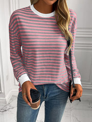 Horizontal stripe crewneck sweatshirt with white cuffs and neckline, in pink and grey.