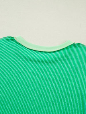 Bright green ribbed t-shirt with contrast stitching and a light green crew neck.