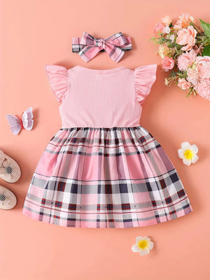 Baby girl pink ribbed top plaid dress with ruffled cap sleeves and matching headband.