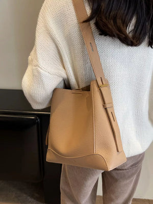 Khaki pebbled leather crossbody bag with adjustable strap
