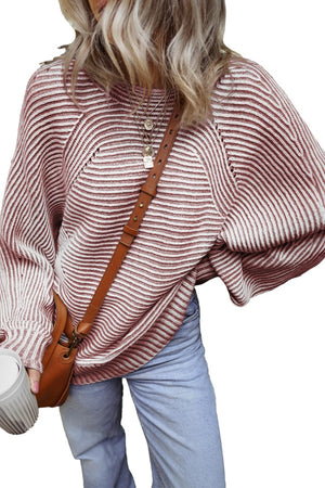 Textured stripe batwing knit sweater in dusty pink with a relaxed fit and crew neck.
