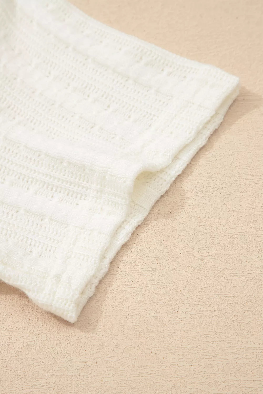White textured maternity t-shirt with V-neck and button details