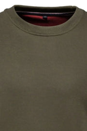 Army green crewneck sweatshirt with red lining and subtle patch detail on the inside neck.