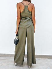 Matcha green cami and pleated palazzo pants outfit set with a black saddle bag.