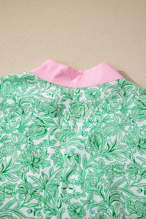 Botanical print midi dress with pink collar and flutter sleeves.