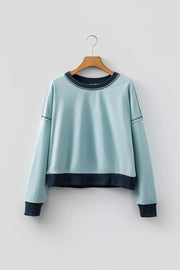 Contrast Edge Colorblock Crop Sweatshirt in Pastel Blue, close-up detail
