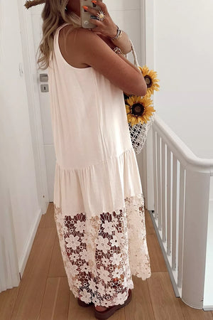 Beige halter maxi dress with airy floral lace hem and tiered skirt.