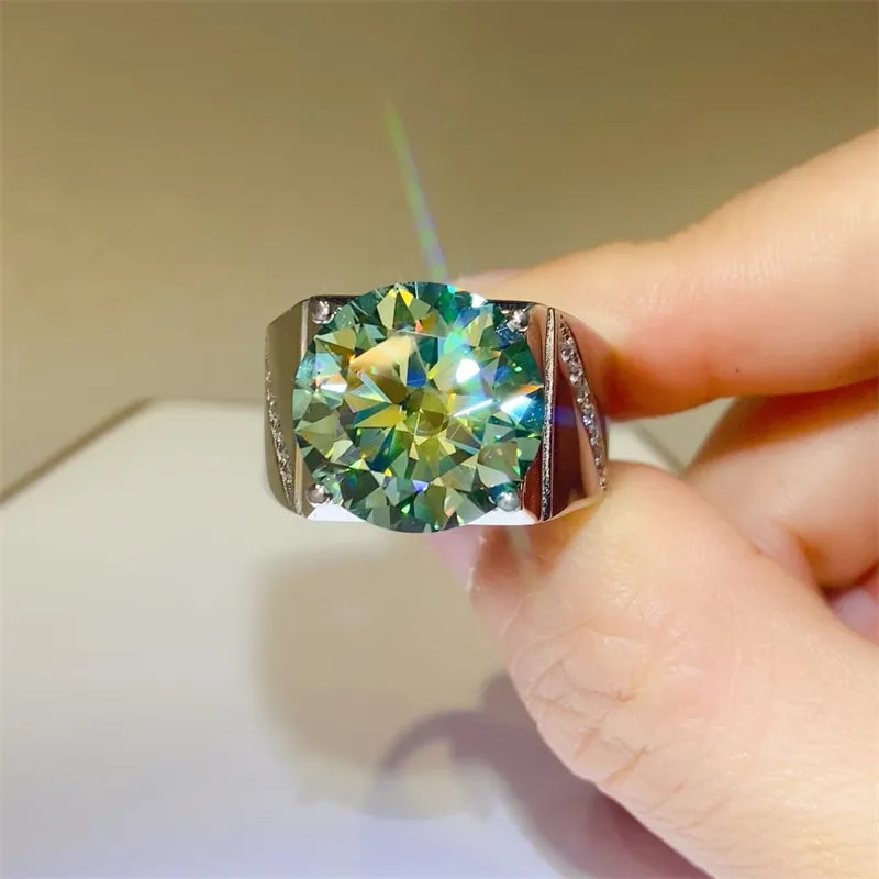 Emerald cut moissanite signet ring in silver with pave accents on the band.