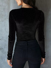 Black velvet ruched long sleeve t-shirt with subtle sparkle detail.