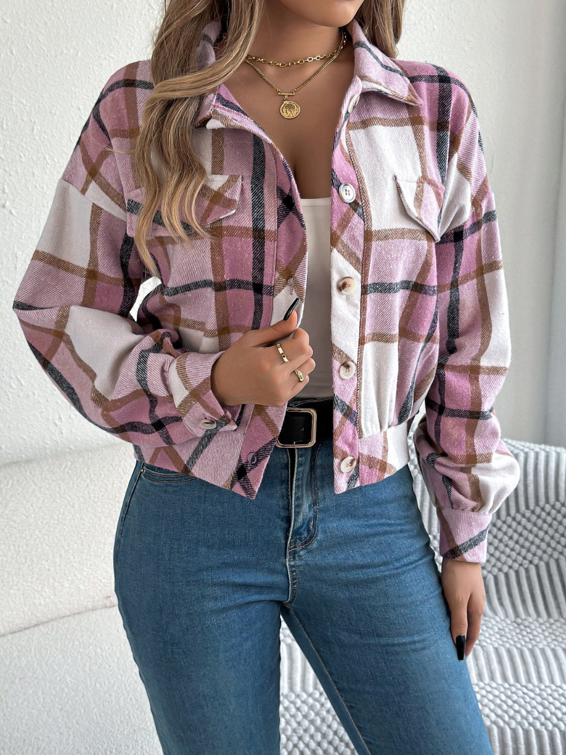 Cropped plaid shacket in dusty pink with gathered sleeves and button front.