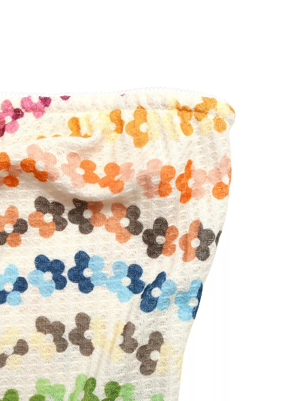 Vibrant floral ruching tank top with a textured knit and colorful daisy pattern.