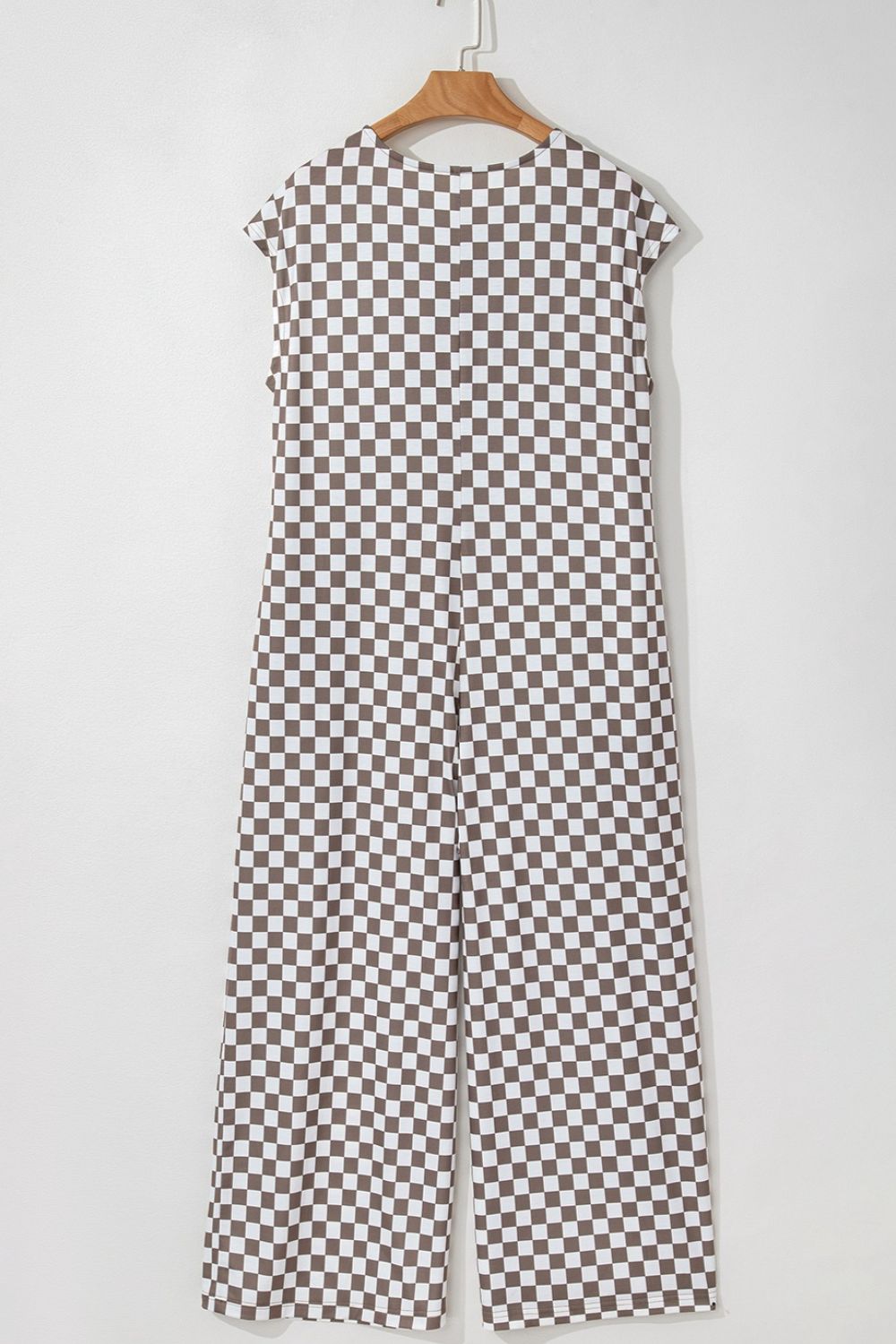 Checkered palazzo jumpsuit in mocha with cap sleeves and wide legs.
