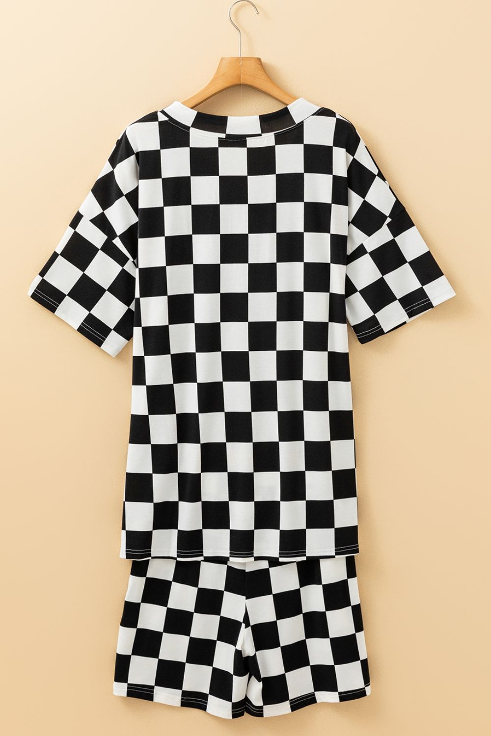 Black and white checkered short sleeve top and shorts outfit set