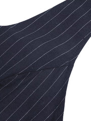 Navy pinstripe maternity halter jumpsuit detail showing fabric and seam.