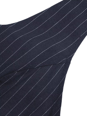 Navy pinstripe maternity halter jumpsuit detail showing fabric and seam.