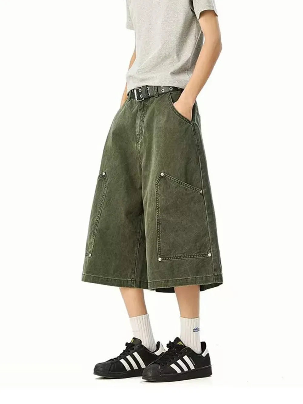 Army green relaxed fit cargo shorts with utility pockets and a below-knee length.