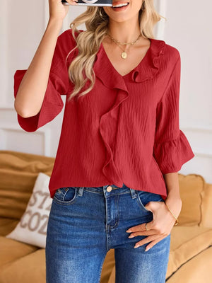 Red maternity shirt with cascading ruffles and 3/4 bell sleeves.