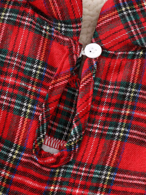 Red plaid baby dress with white button detail and cotton blend fabric.