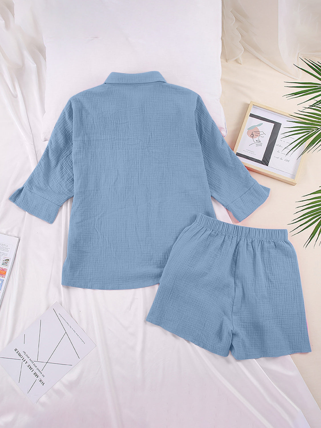 Light blue gauze cotton resort shirt and shorts set with buttoned shirt and elastic waist shorts.