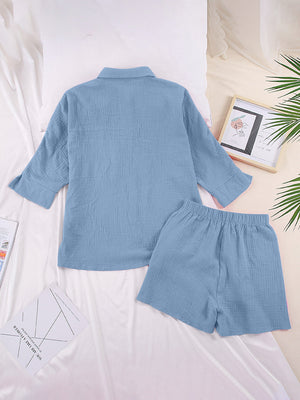 Light blue gauze cotton resort shirt and shorts set with buttoned shirt and elastic waist shorts.