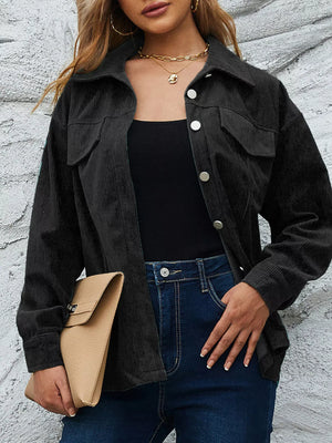 Black corduroy button-up jacket with chest pockets and silver buttons.
