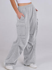 Light gray sweatpants with cargo pockets and a wide leg cut.