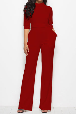 Deep Red high-neck belted palazzo jumpsuit with 3/4 sleeves and wide legs.
