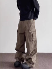 Men's brown baggy cargo sweatpants with multiple pockets.