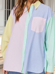Colorblock striped oversized button-down shirt with pastel panels and chest pocket.