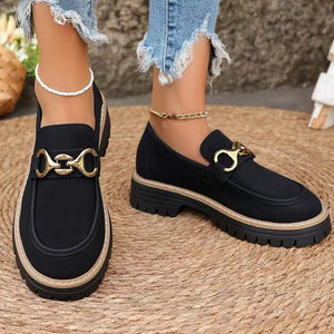 Black chunky chain detail platform loafers with gold hardware and lug sole.