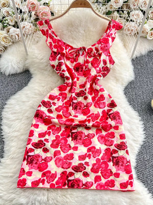 Charming floral ruffle trim mini dress with bow detail and square neckline.