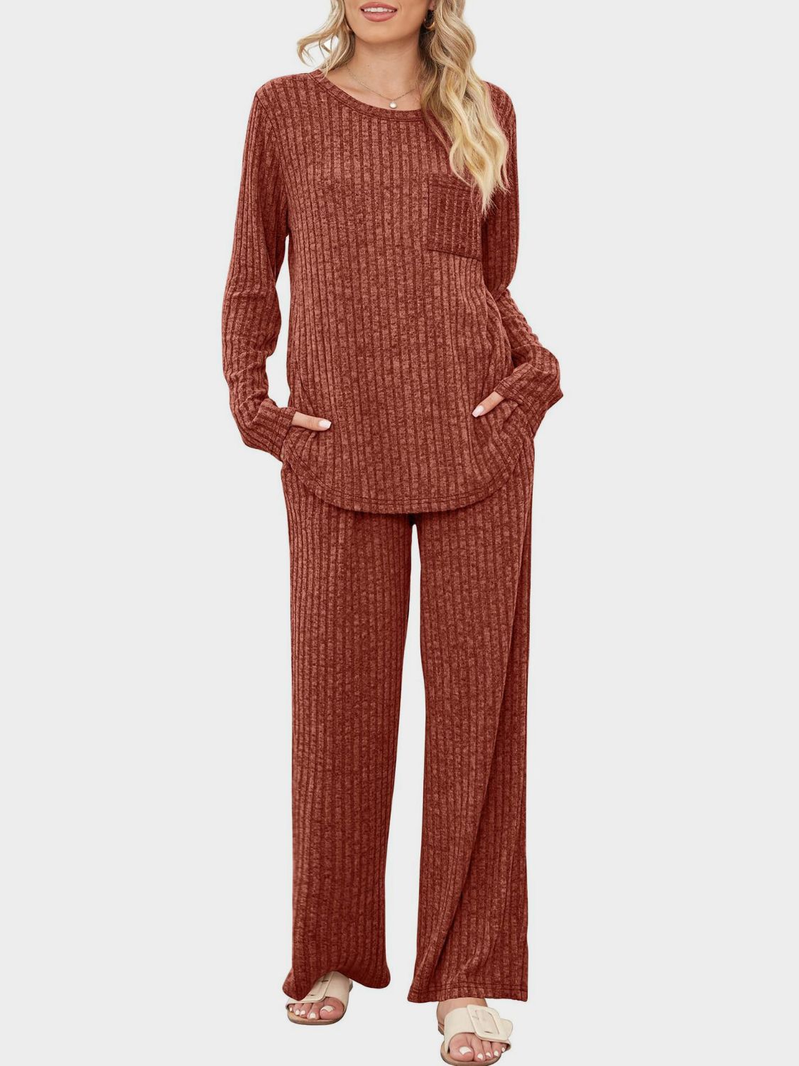 Ribbed knit lounge set in Terracotta with long sleeves, crew neck, chest pocket, and wide-leg pants.