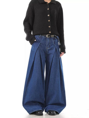 Men's dark blue 100% cotton jeans with deep pleats and a voluminous wide leg.