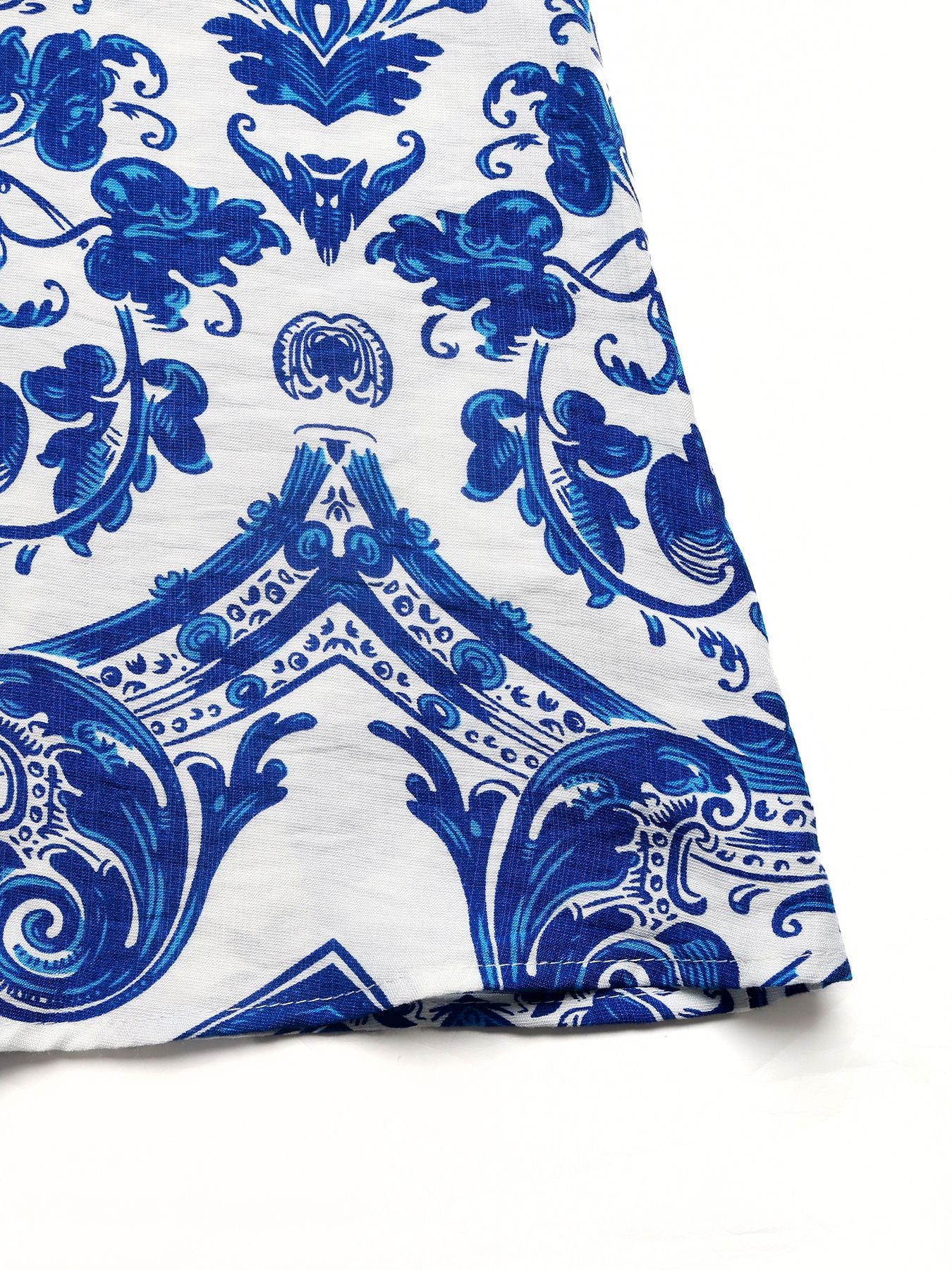 Blue and white patterned maxi dress fabric detail